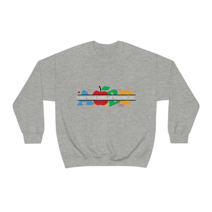 " A Great Teacher Inspires and Transforms Lives" Unisex Heavy Blend™ Crewneck Sweatshirt